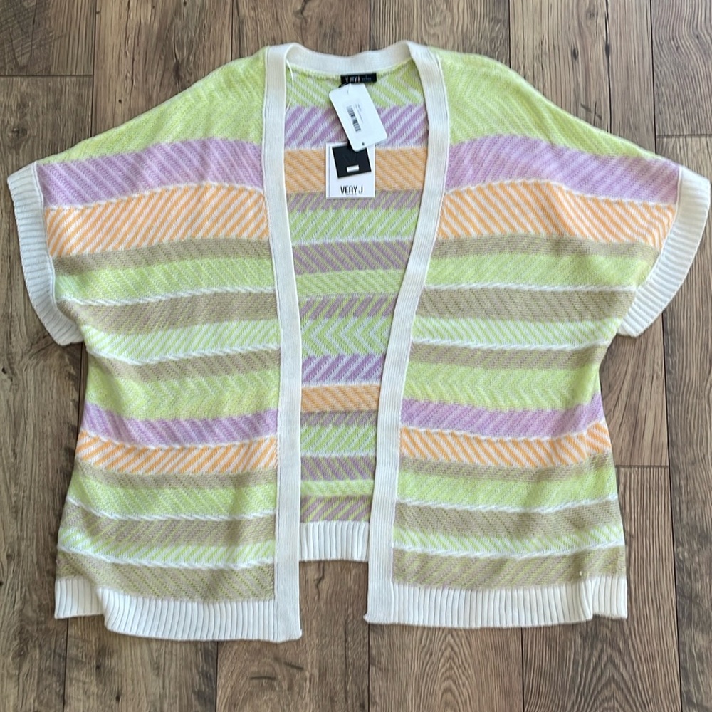 Very j short sleeved cardigan. Women’s size large.